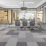 Block pattern office carpet tiles in conference room