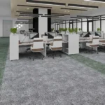 Gray carpet tiles with a subtle green border path in a modern office setup