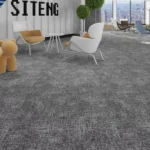 Gray mottled carpet tiles in a modern lounge area with tan seating