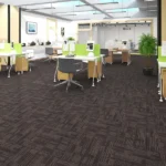 Modern office workspace featuring dark brown patterned carpet tiles