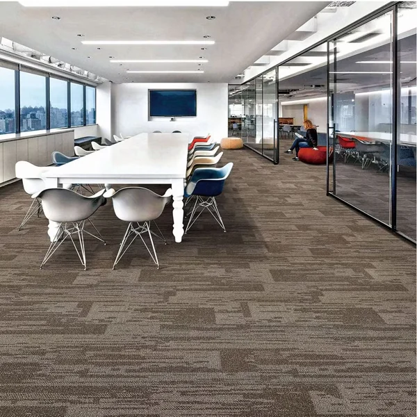 Modern open office featuring textured brown carpet tiles