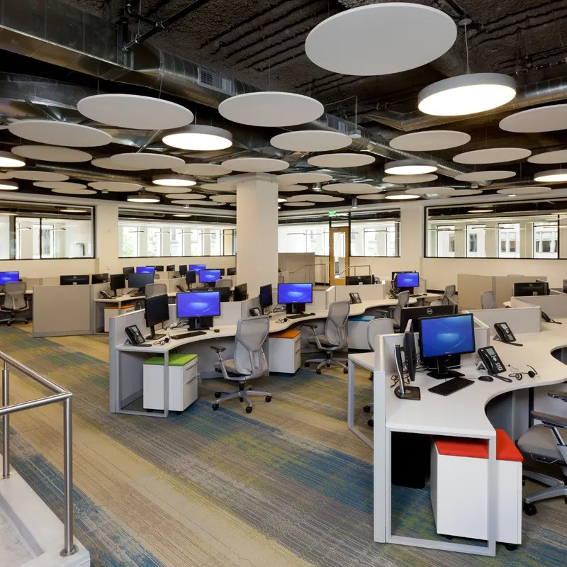 Multi-colored striped commercial carpet tiles installed in a modern office