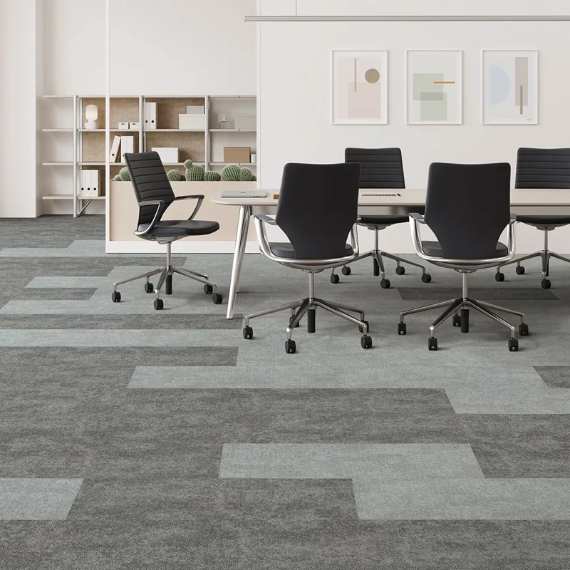 Two-tone grey block carpet tiles in office conference room