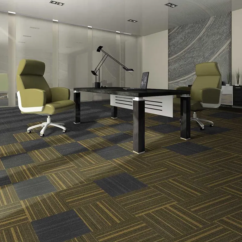 commercial carpet tiles with solid dark gray accent squares installed in a private executive office.